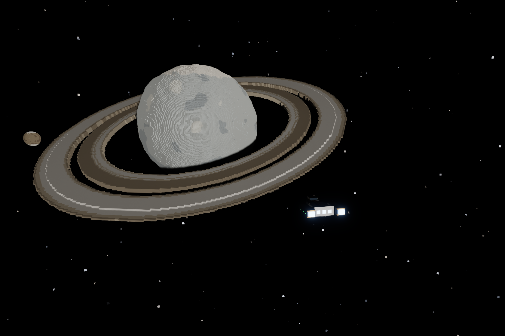 A pale grey cratered world encircled by wide brown and grey rings